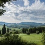 Panoramic view of golf course and Tuscan hills in Chianti.