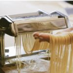 Fresh tagliatelle cut with a pasta machine during the Chianti pasta making class