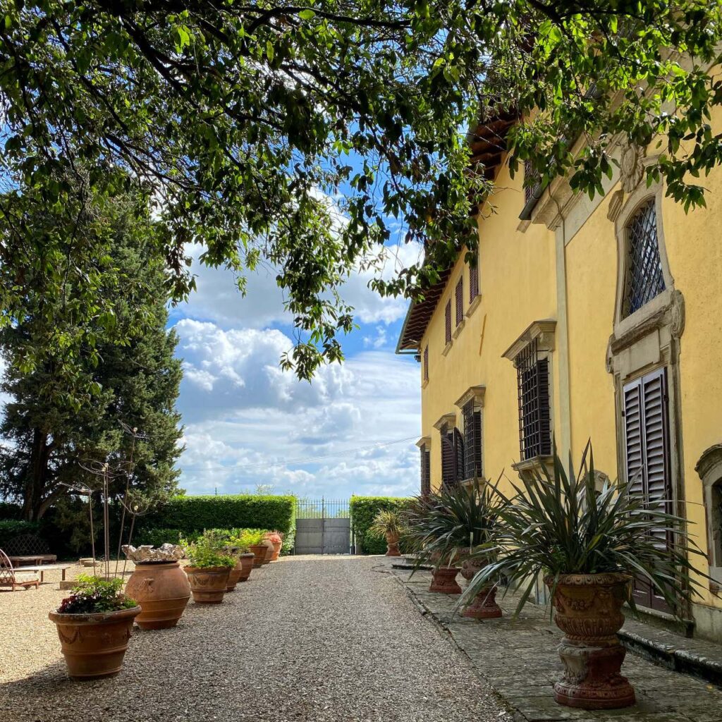 Historic villa courtyard entrance for a chianti cooking class with olive oil tasting in the Tuscan countryside