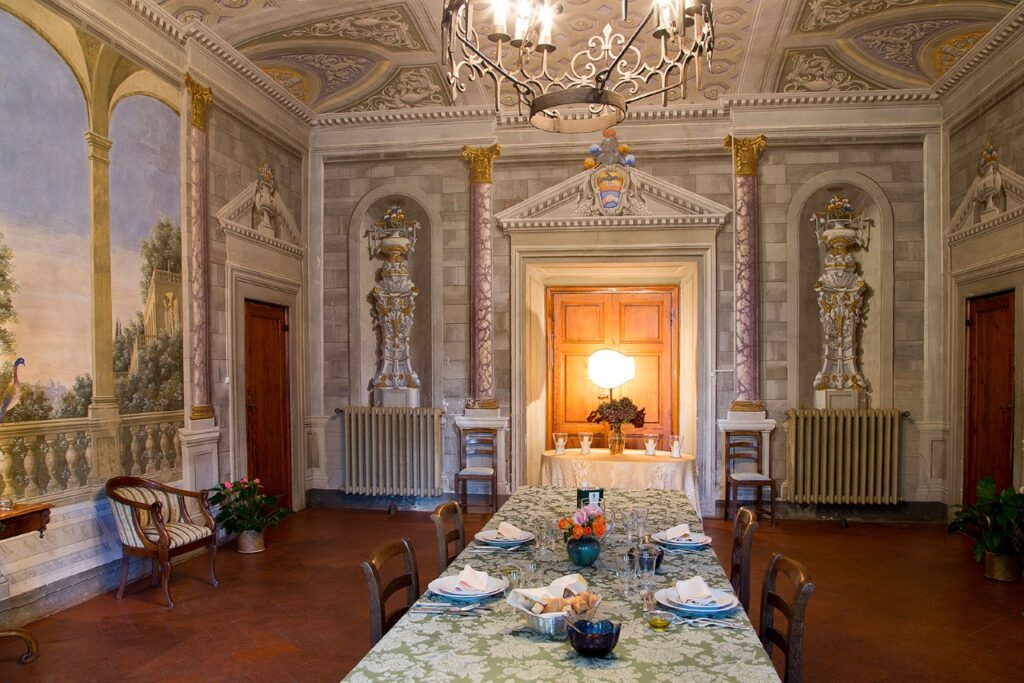 Private cooking class in Chianti served in a frescoed dining hall inside a historic family villa estate