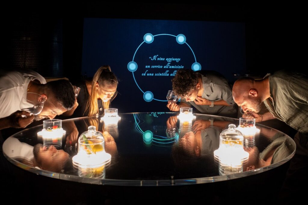 Guests enjoying an immersive group wine tasting at Podere Ema.