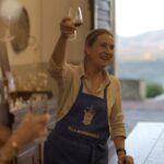Host welcoming guests at a historic family villa during a cooking near Florence in the Tuscan countryside
