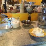 ingredients and equipment prepared for dessert during a cooking class