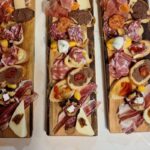 assorted Tuscan appetizers with cheese and cured meats for wine tasting