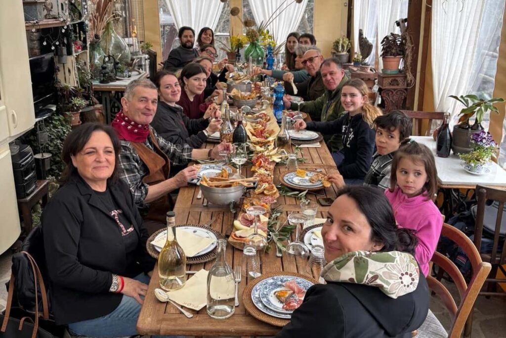 pouring red wine during Chianti horseback wine tour from Florence