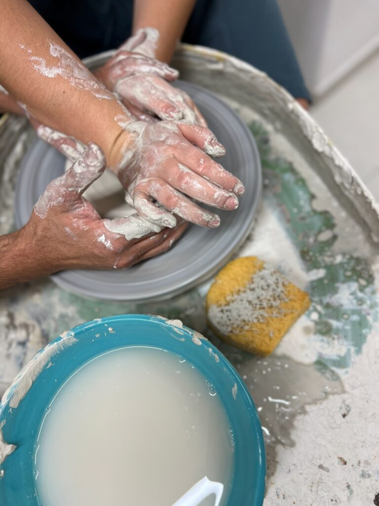 Hands-on clay practice during a private pottery workshop Tuscany session